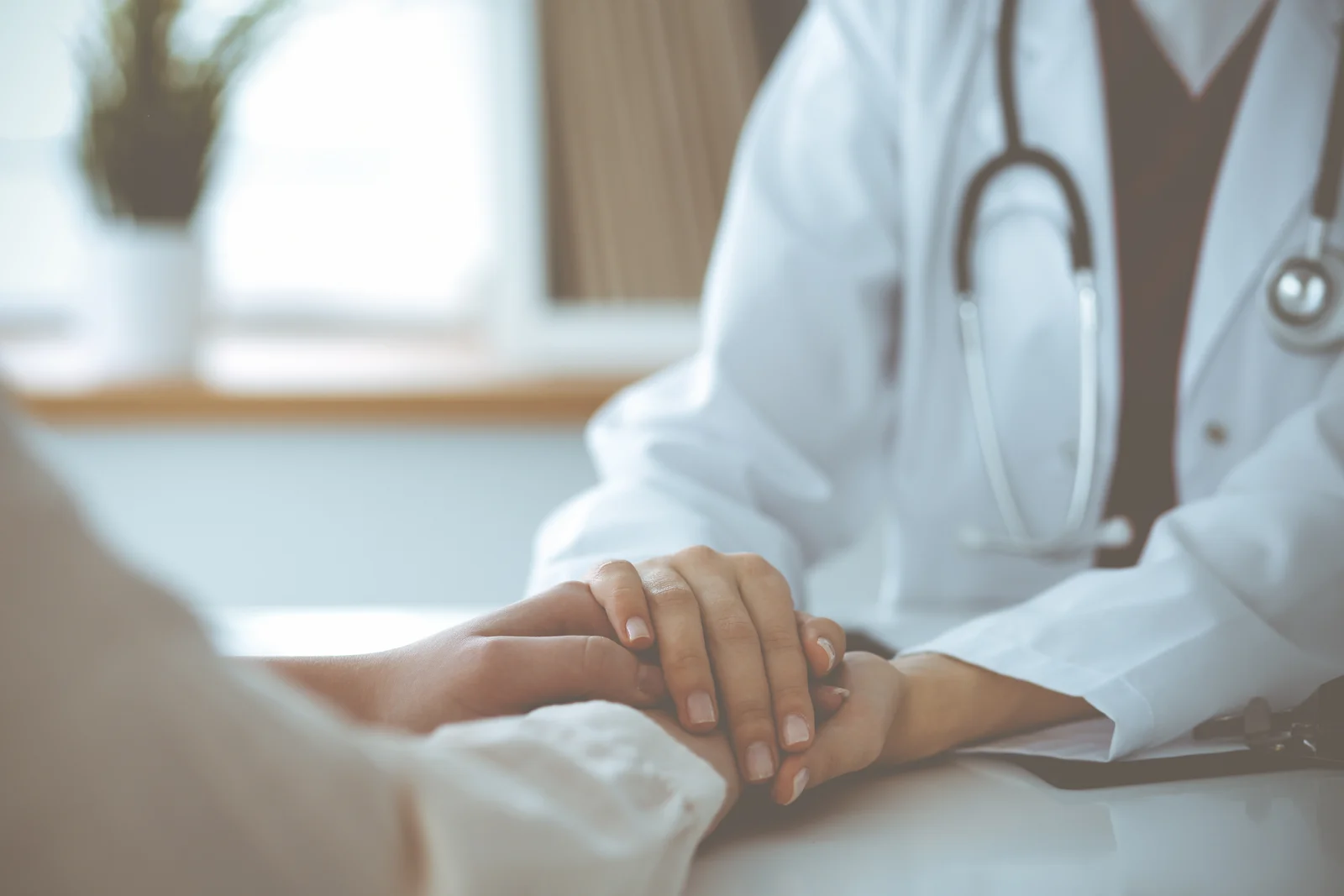 A clinician speaking with a patient